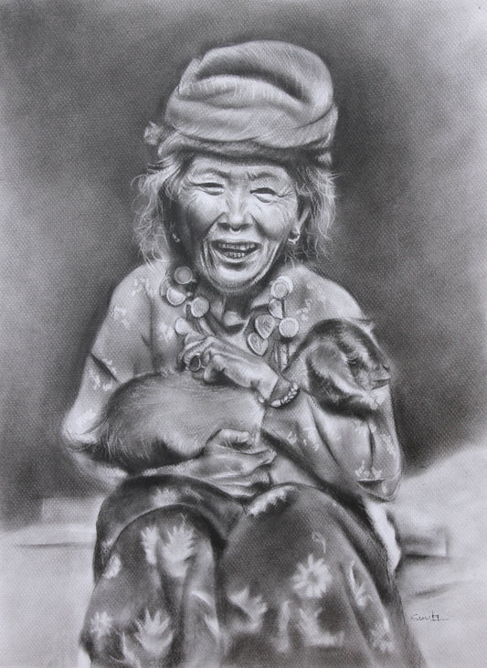 Tibetanske gamle kvinder med en gedunge